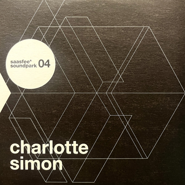 Charlotte Simon - Being Filmed In Fake Rain In A Fake Garden